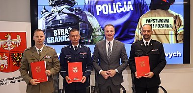 Policja, straż graniczna i straż pożarna z dofinansowaniem z województwa-100912
